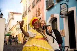 A tourist takes photo with a cubanian woman